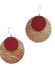 Red and gold leather earrings inspired by sun and moon