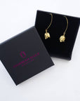 Delicate petal-shaped brass earrings inspired by nature