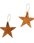 Pair of copper-toned leather star earrings with a textured finish and gold-tone hooks, shown on a white background