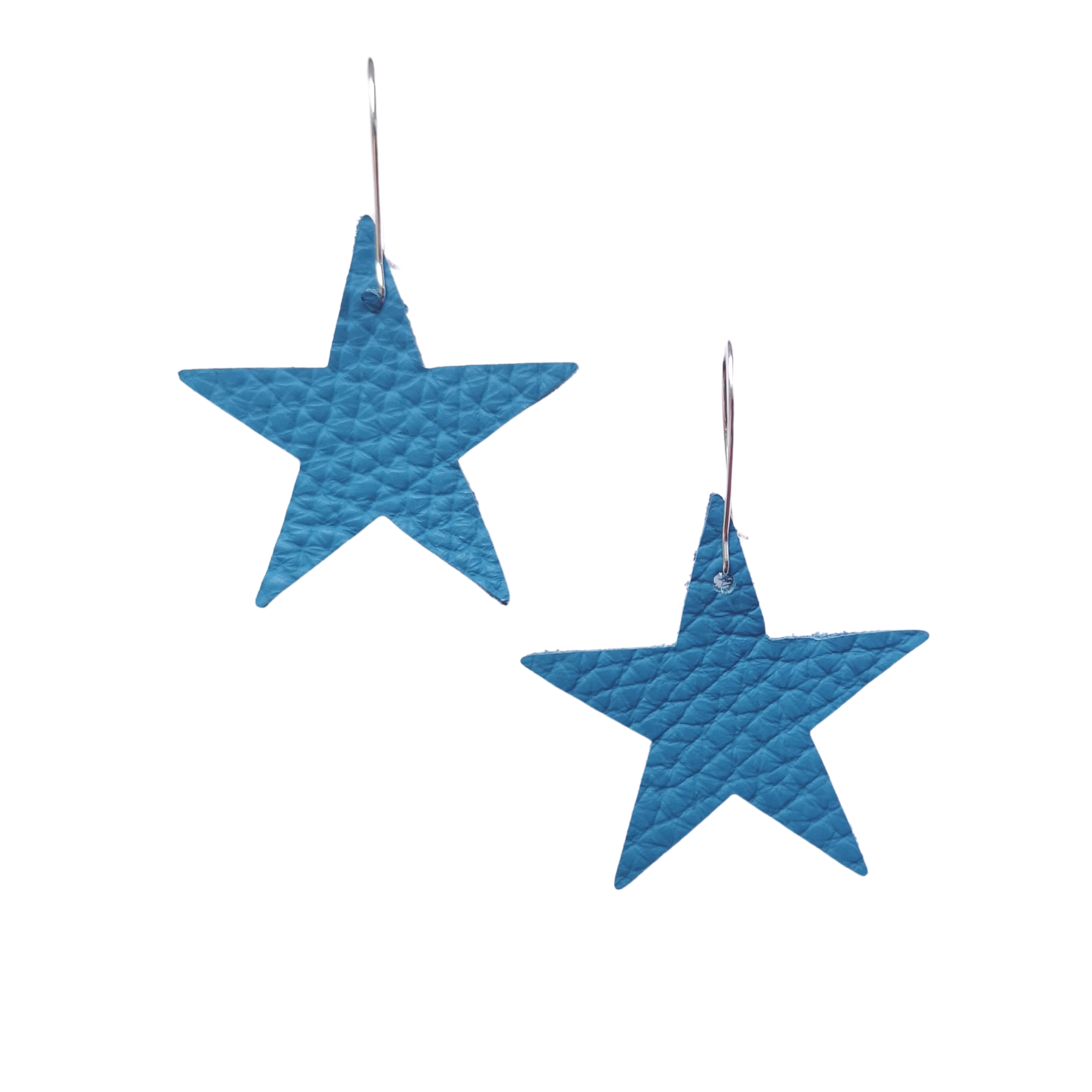Pair of bright blue leather star earrings with visible texture and gold hooks, photographed against a plain white background