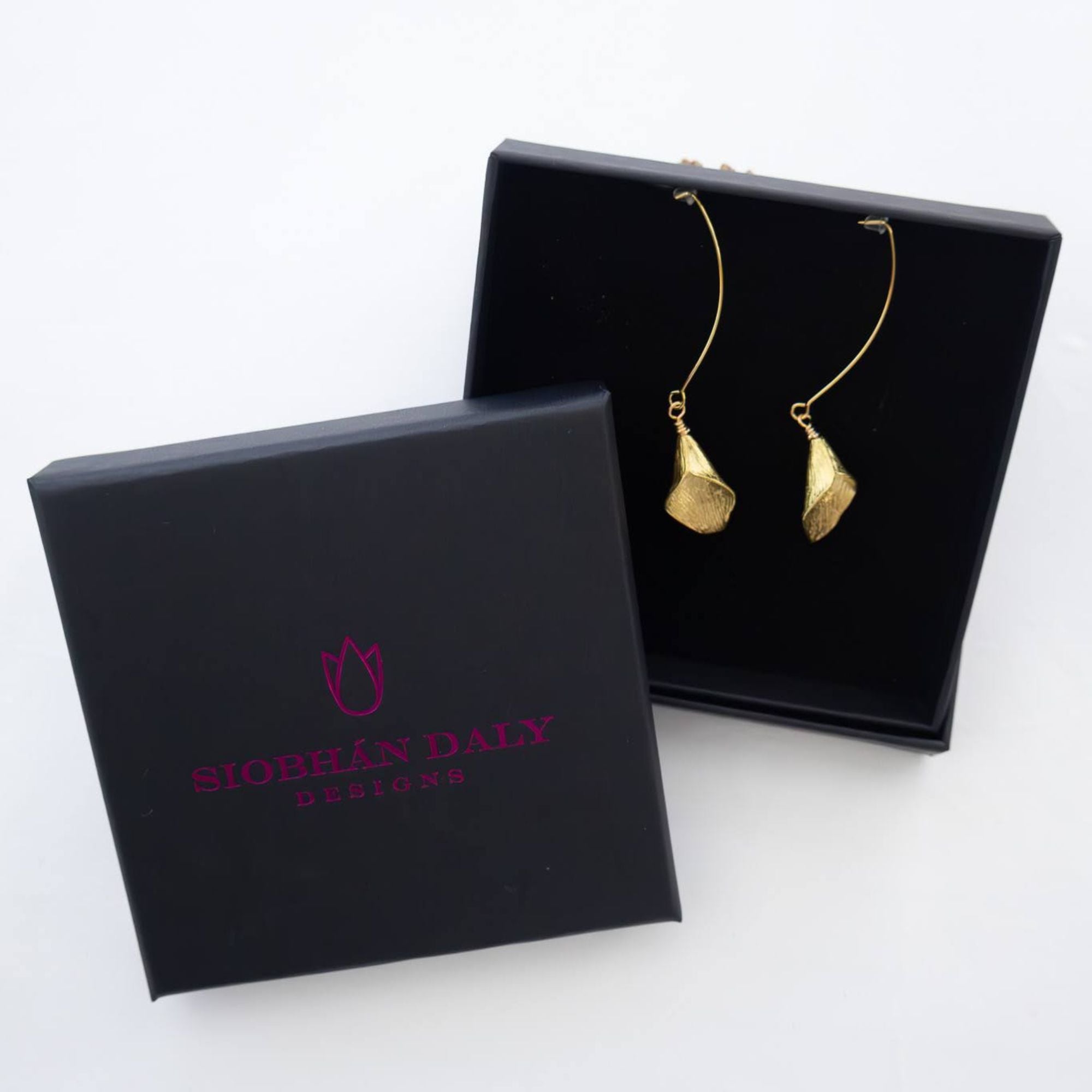 Brass lily earrings with elongated shape – handmade in Ireland