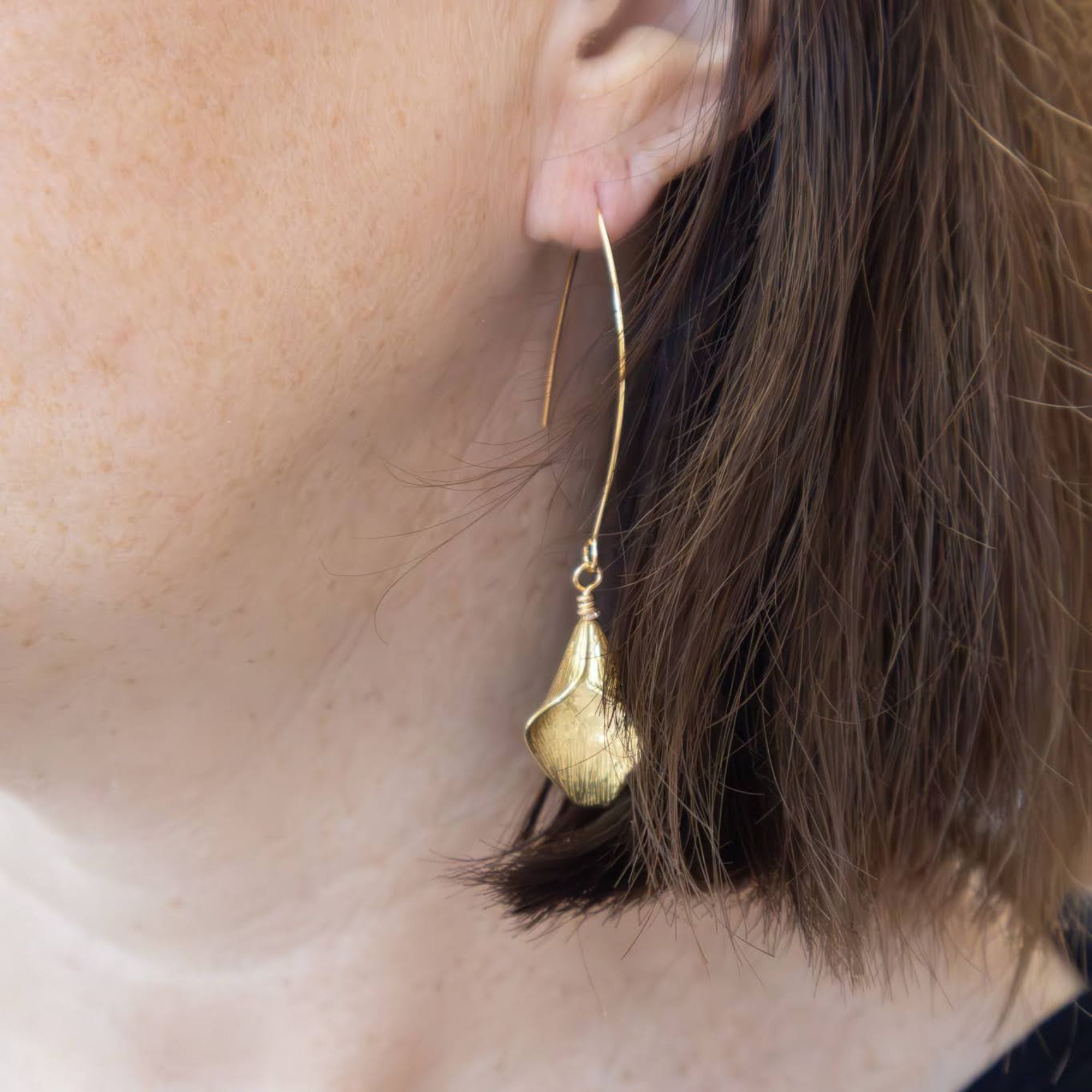 Lightweight brass earrings flattering all face shapes