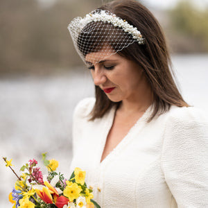 Bridal headpiece with pearls and veiling 