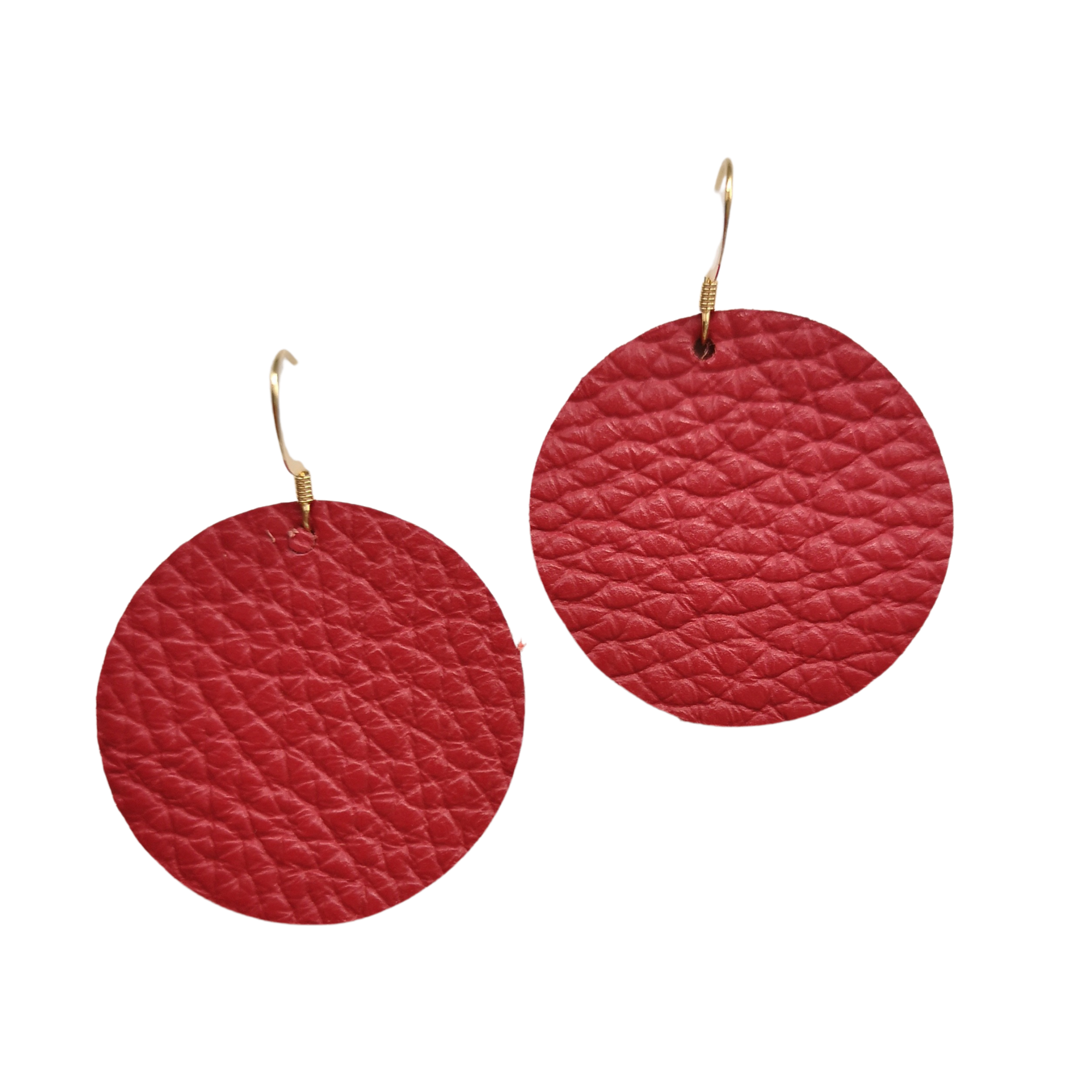 Grian leather earrings in rich red – circular statement earrings with gold hooks on a white background