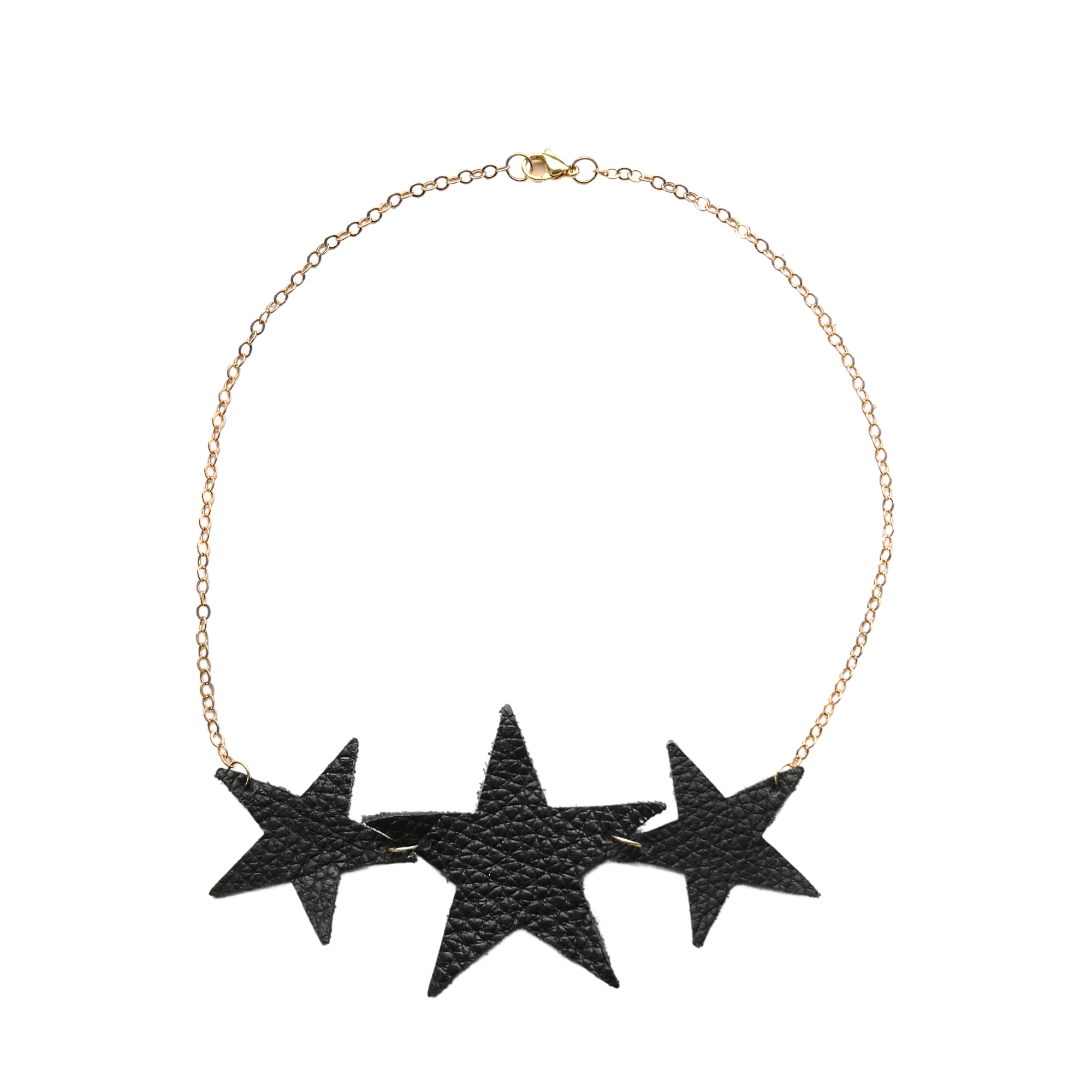 Réalt Star Necklace in black leather with three statement stars and a gold chain, laid flat on a white background