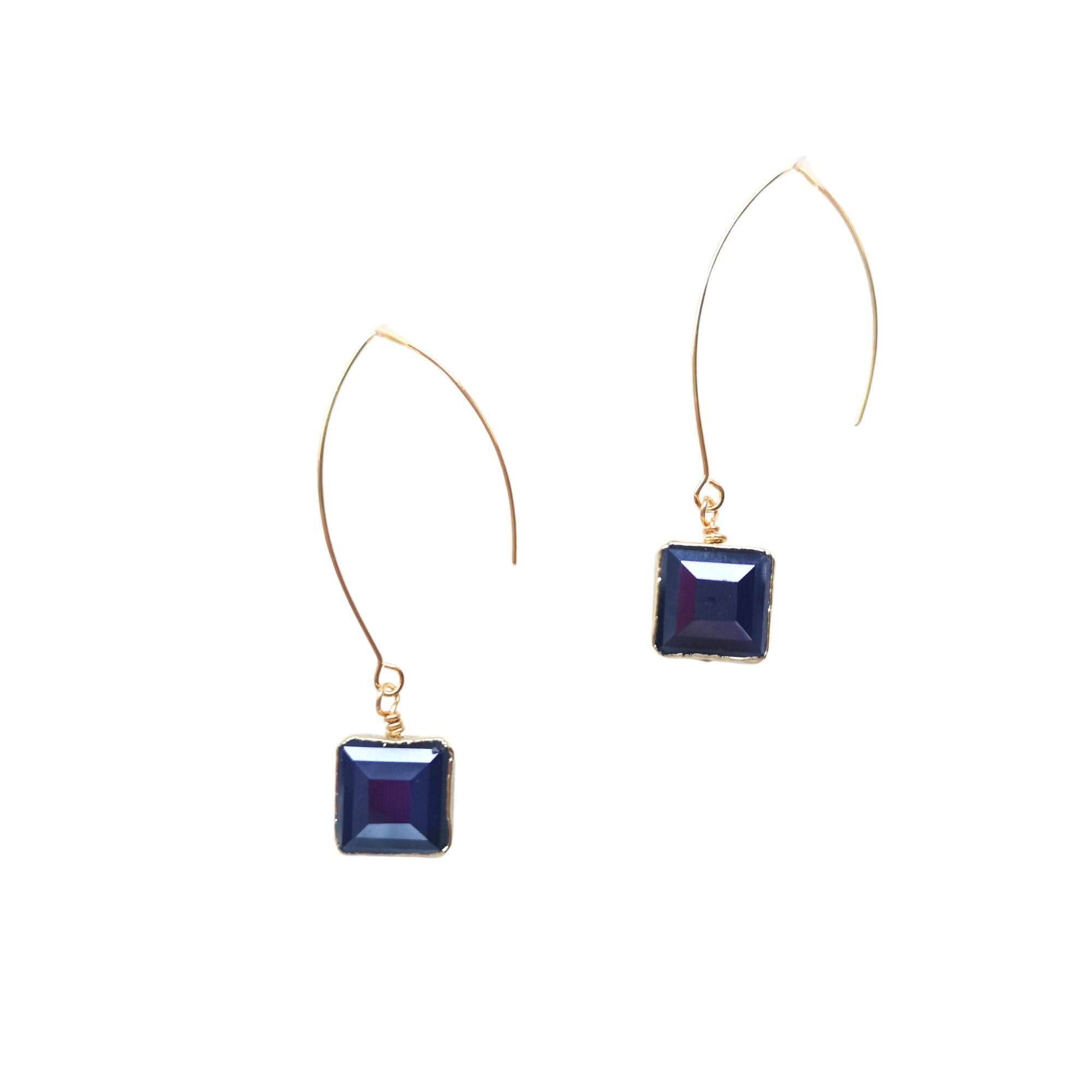 Brass and blue glass earrings designed for Irish complexions