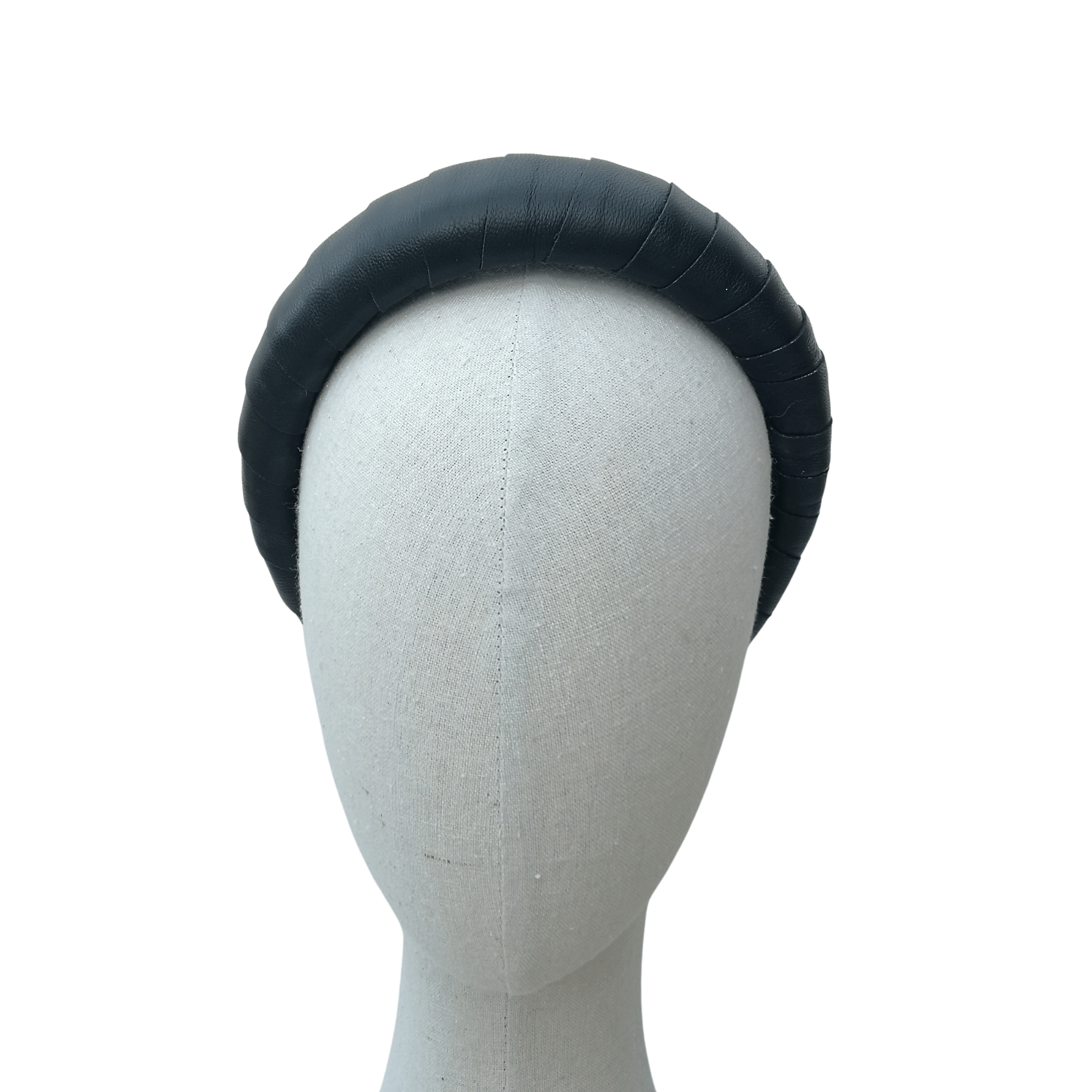 Black padded headband displayed on a neutral mannequin head against a white background