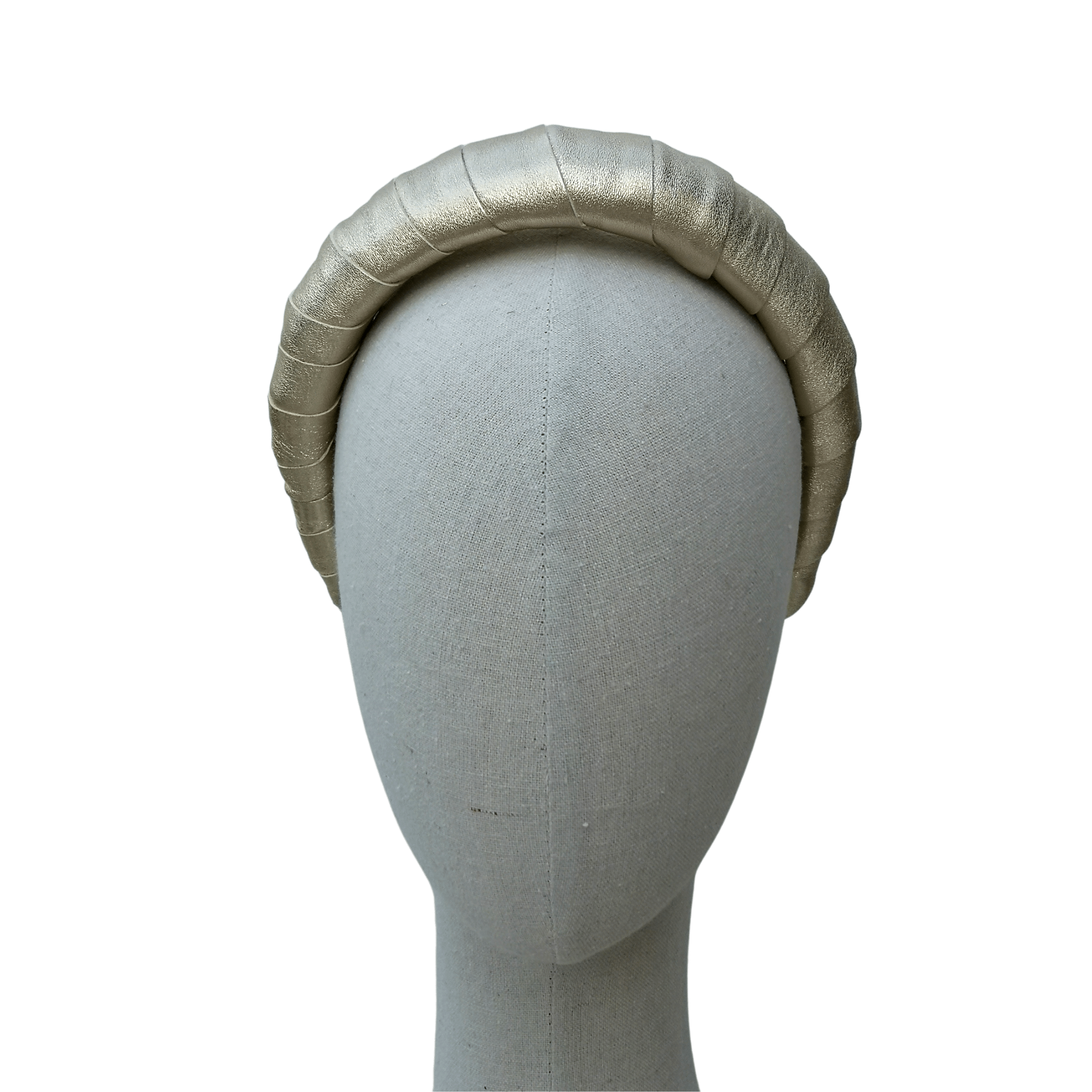 Textured champagne-gold headband with a soft sheen, shown on a fabric-covered mannequin head