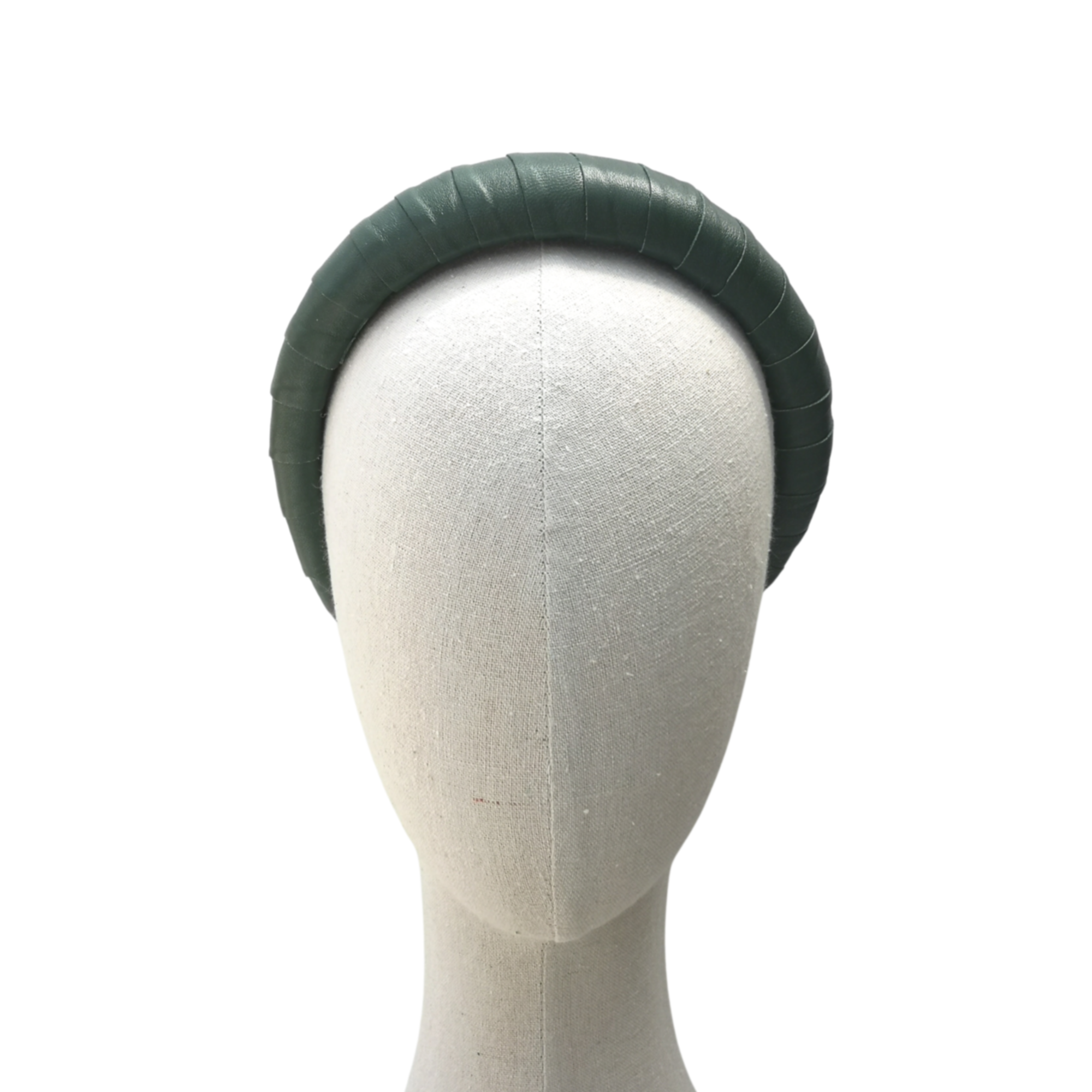 Dark green satin-look padded headband displayed on a neutral mannequin head against a white background