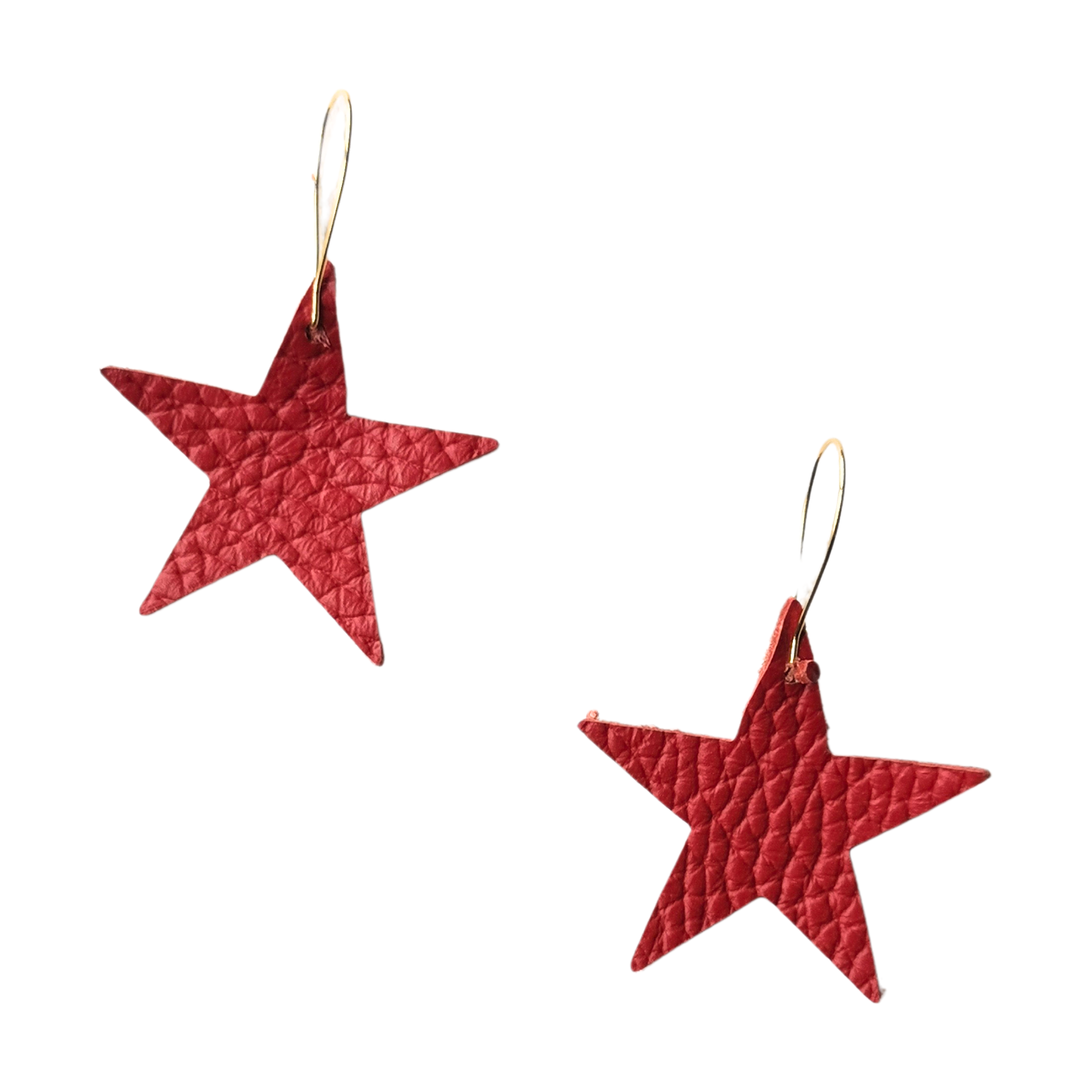 Pair of rich red leather star earrings with visible grain texture and gold-plated hooks, shown against a white background